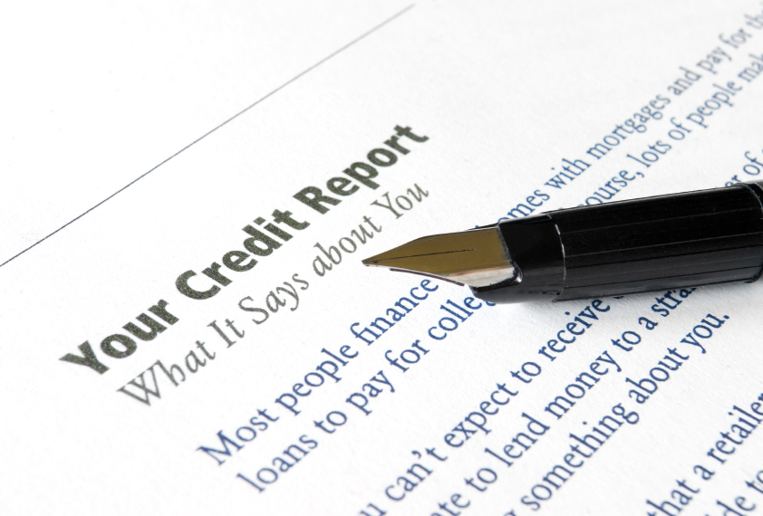 Credit report and a pen