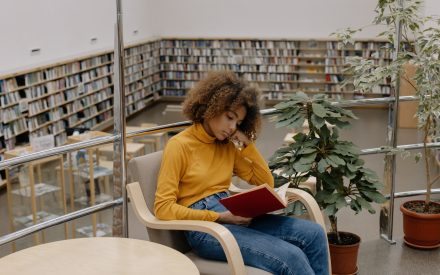 Person Studying in Library