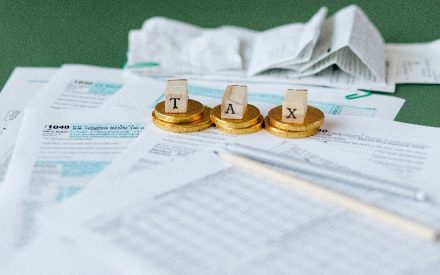 Tax forms on a table with receipts