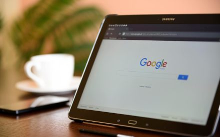 A laptop with a popular search engine on the screen